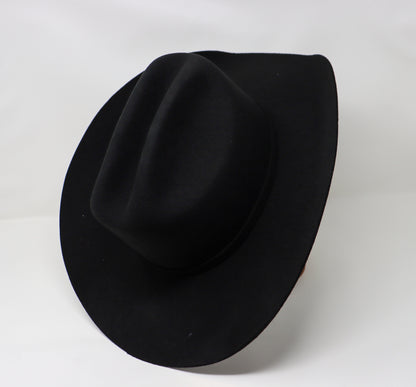 Black fedora hat on a white background